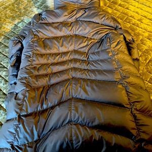 Marmot knee-length down coat. Faux fur detachable hood.